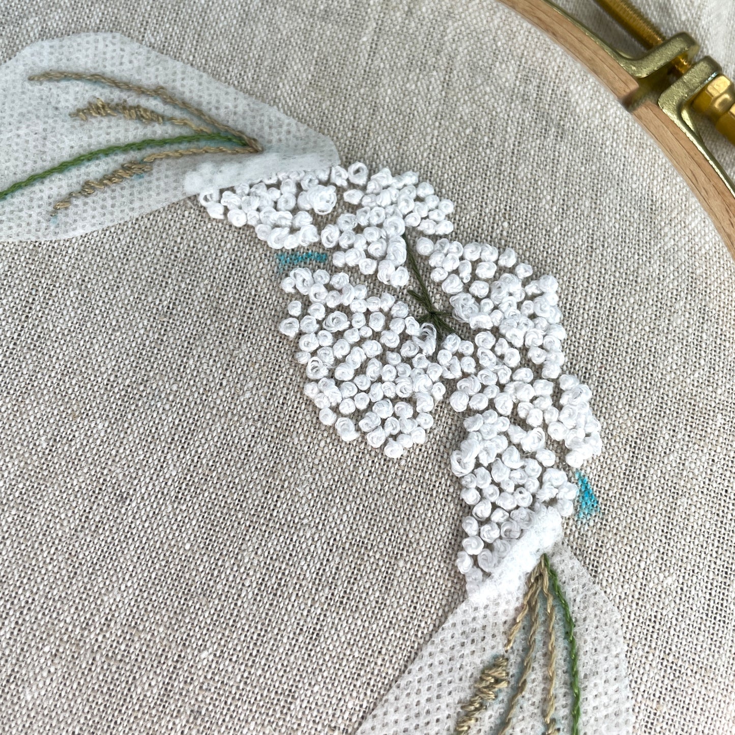 close up of cow parsley embroidered with French knots