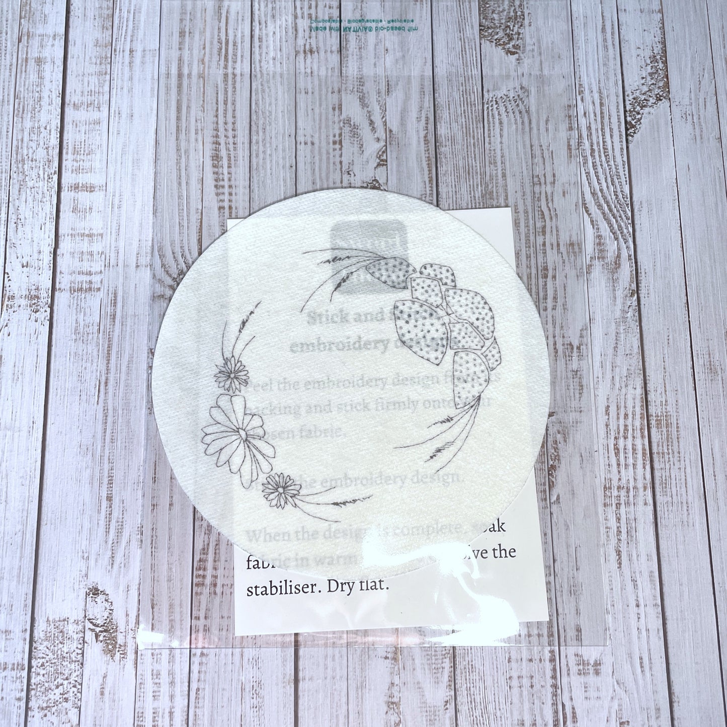 Cellophane packaging for stick and stitch patch, with instructions included