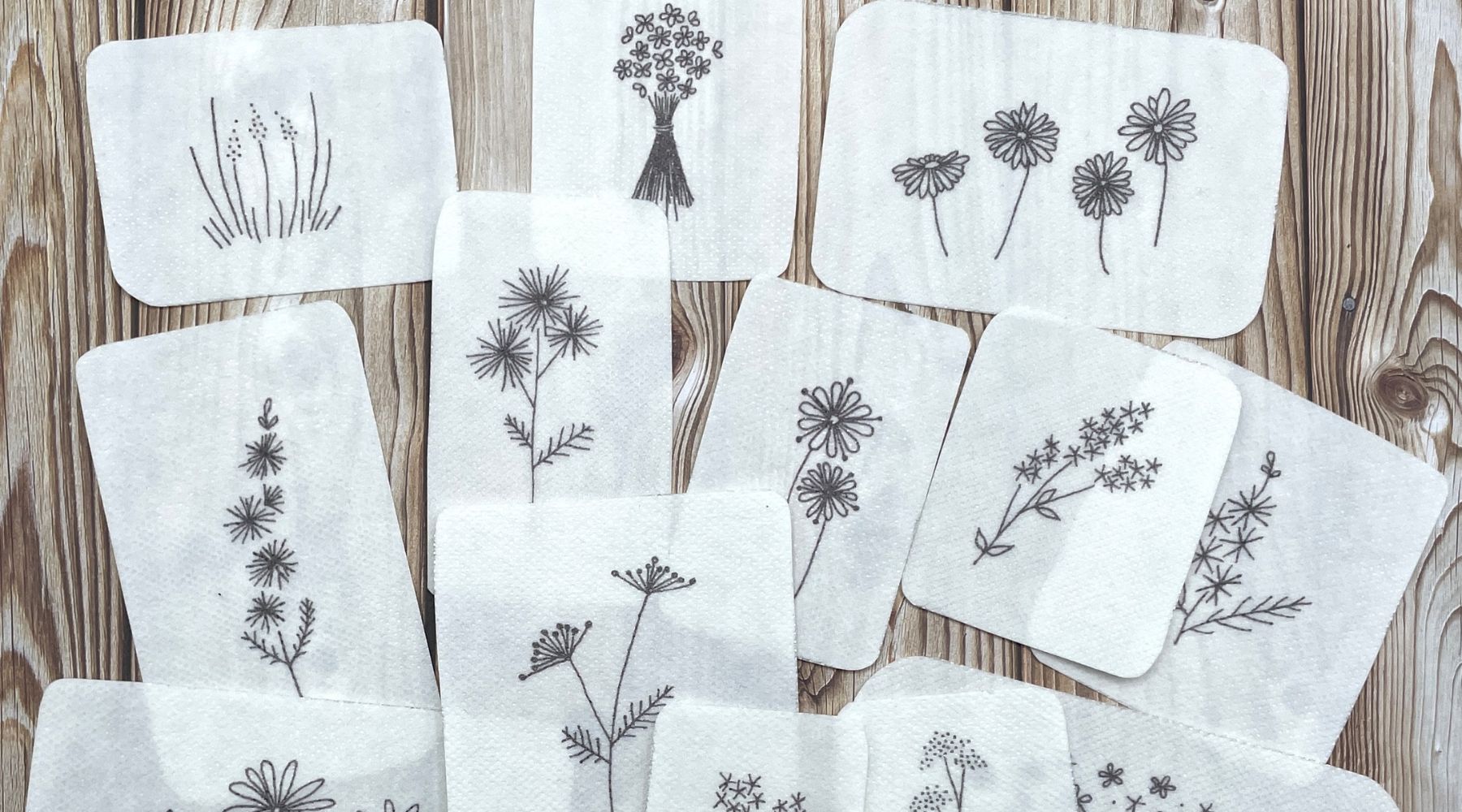 Small floral embroidery designs on wash away stabliser.