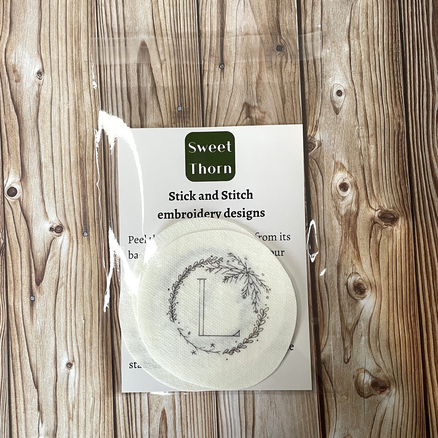 Stickers packaged in a cellophane bag with an instruction card.