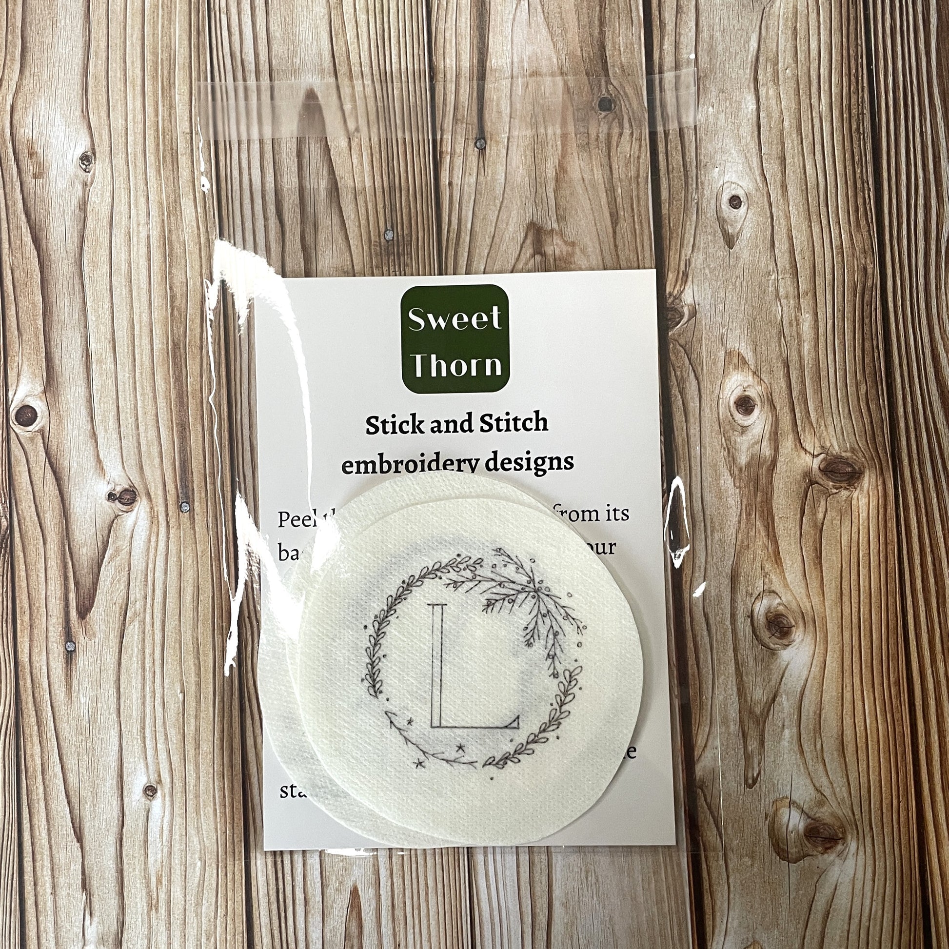 Stickers packaged in a cellophane bag with an instruction card.