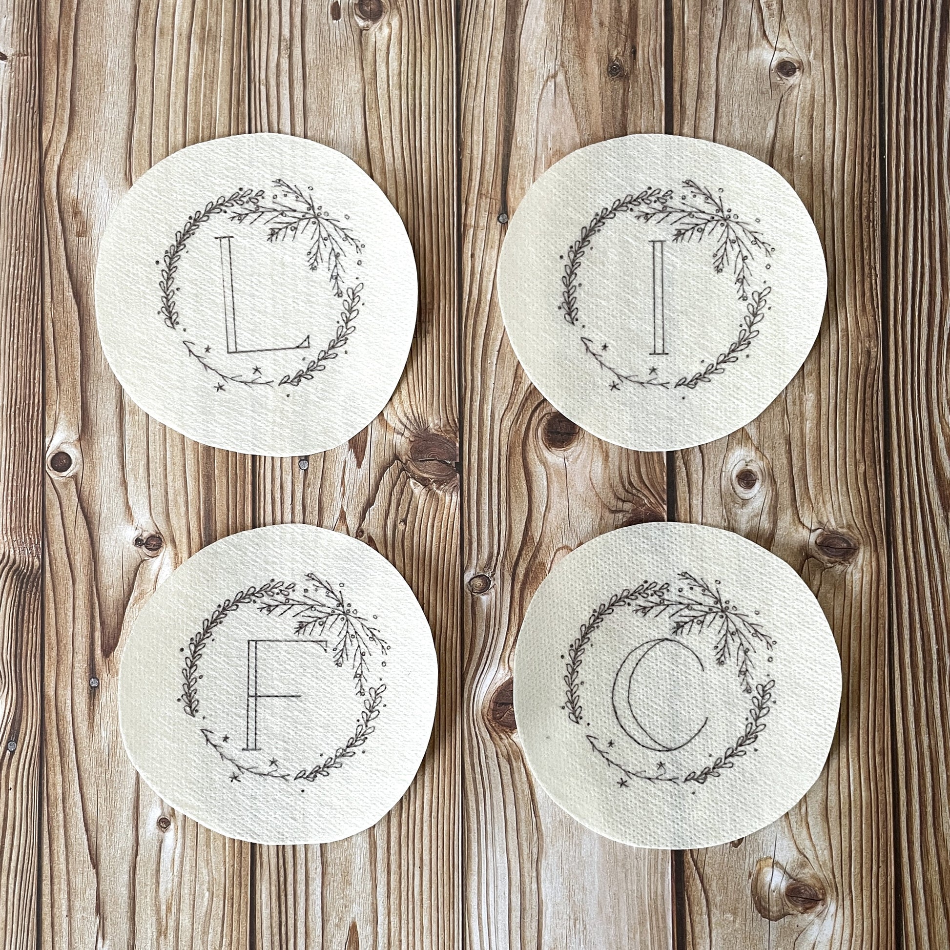 First pack option: four embroidery wreath stickers.