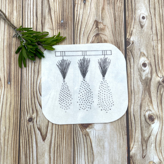 Embroidery sticker showing lavender hung up to dry.